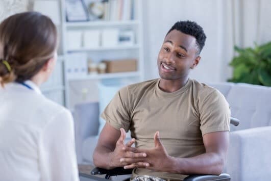 an employee talking to a counsellor about harassment