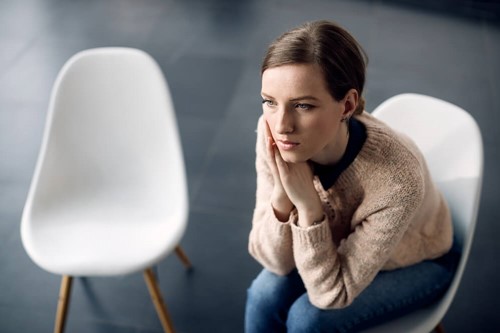 unhappy employee sitting quietly